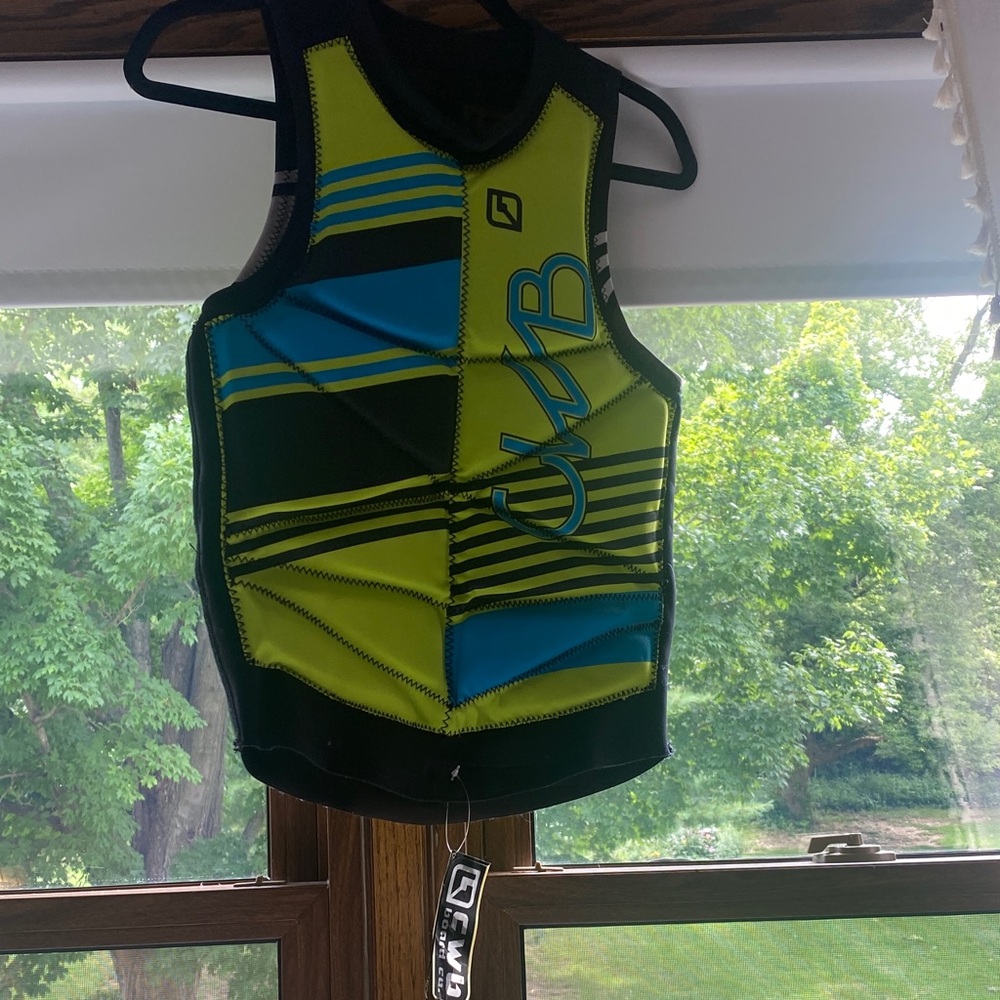 Never used with tags! Neon Green and Blue water sport vest.